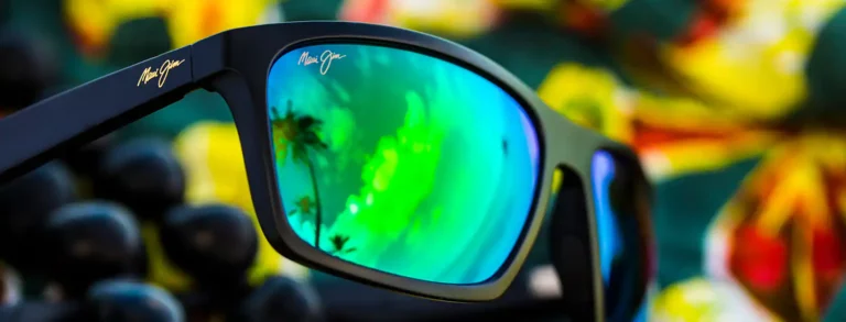 Maui Jim Sports sunglasses at The Indie Optician at Observatory - green lenses with reflection of palm tree